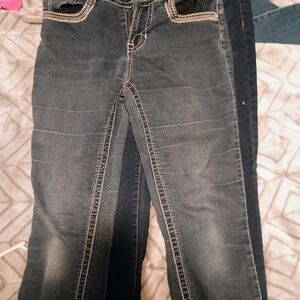 Blue Skinny Jeans with Distressed Details and Whiskering